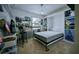 Fun bedroom with a Murphy bed, storage, and window at 9208 Chandler Dr, Groveland, FL 34736