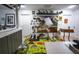 Amusing entertainment room with Storm Trooper figure, dinosaur skeletons, and a colorful roadway rug at 9208 Chandler Dr, Groveland, FL 34736