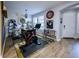 Bright and spacious office with an exercise bike, chalkboard wall, large desk, and natural light at 9208 Chandler Dr, Groveland, FL 34736