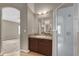 Bathroom featuring a vanity, shower, and neutral tones at 9871 Nonacrest Dr, Orlando, FL 32832