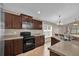 Well-equipped kitchen featuring stainless steel appliances and ample counter space at 9871 Nonacrest Dr, Orlando, FL 32832
