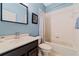 Bathroom features a single vanity, a toilet, and a shower-tub combination at 10030 Chatham Oaks Ct, Orlando, FL 32836