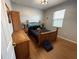Charming bedroom with wood furniture, light walls, and a bright window at 10075 Sw 91St Pl, Ocala, FL 34481