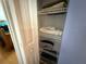 Linen closet with white wire shelving at 10075 Sw 91St Pl, Ocala, FL 34481