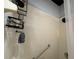 The shower features white tiles and a black metal caddy at 10075 Sw 91St Pl, Ocala, FL 34481