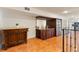 A finished basement bar area with custom cabinetry, wine fridge, and terracotta tile flooring offers stylish entertaining space at 1010 Terrace Blvd, Orlando, FL 32803