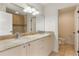 Bright bathroom with a double vanity, tiled shower and updated fixtures at 1010 Terrace Blvd, Orlando, FL 32803