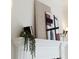 Close up of a modern fireplace mantel with decorative art and candles at 1010 Terrace Blvd, Orlando, FL 32803