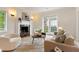 Elegant living room features a marble fireplace, modern decor and plenty of natural light at 1010 Terrace Blvd, Orlando, FL 32803