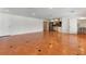 Spacious living area with terracotta tiled floors, recessed lighting, and access to a nearby kitchen and bathroom at 1010 Terrace Blvd, Orlando, FL 32803