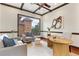 Bright office space with large window, modern desk, and comfortable seating at 1010 Terrace Blvd, Orlando, FL 32803
