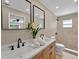 Modern bathroom featuring double sinks, granite countertop, and tiled shower at 10545 Parkway Dr, Clermont, FL 34711