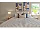 Comfortable bedroom featuring neutral tones and natural light, creating a relaxing atmosphere at 10545 Parkway Dr, Clermont, FL 34711