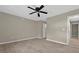 Empty bedroom with neutral paint and tile flooring at 10545 Parkway Dr, Clermont, FL 34711