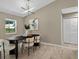 Dining room featuring modern lighting, neutral walls, and tile floors at 10545 Parkway Dr, Clermont, FL 34711