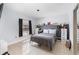 Neutral bedroom featuring tile floors and ample natural light at 11900 Frieth Dr, Orlando, FL 32837