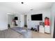 Neat bedroom with tile floors, a ceiling fan, and ample natural light at 11900 Frieth Dr, Orlando, FL 32837