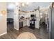 Well-lit kitchen boasts stainless steel appliances, wood floors, and decorative accents at 11900 Frieth Dr, Orlando, FL 32837