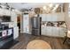 Bright kitchen featuring stainless steel appliances, wood floors, and ample cabinet space at 11900 Frieth Dr, Orlando, FL 32837