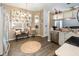 Cozy eat-in kitchen with stainless steel appliances, tile backsplash, and natural light at 11900 Frieth Dr, Orlando, FL 32837
