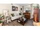 Cozy living room with comfortable seating, stylish decor, and a large window at 11900 Frieth Dr, Orlando, FL 32837