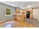 Bright kitchen features wooden cabinets, modern appliances, and a breakfast bar at 12046 Se 135Th Ave, Ocklawaha, FL 32179