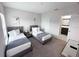 Bedroom with two twin beds, carpet, and neutral paint at 123 Kenny Blvd, Haines City, FL 33844