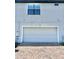 Attached two car garage for a townhome with brick paved driveway at 123 Kenny Blvd, Haines City, FL 33844