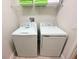Laundry room with white washer and dryer at 123 Kenny Blvd, Haines City, FL 33844