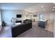 Living room with carpet, modern furniture and open floor plan at 123 Kenny Blvd, Haines City, FL 33844