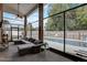 Spacious sunroom features a clear view of the pool, creating a seamless transition to outdoor leisure at 13 Bass Lake Dr, Debary, FL 32713