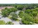 Aerial view of the home nestled among mature trees at 1505 Magnolia Ave, Sanford, FL 32771