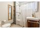Bathroom with shower and decorative tiled walls and vanity sink at 1505 Magnolia Ave, Sanford, FL 32771