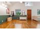 Inviting living area with hardwood floors, natural light, and neutral decor, offering a warm and welcoming atmosphere at 1505 Magnolia Ave, Sanford, FL 32771