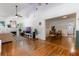 Bright living space showcasing hardwood floors, a cozy fireplace, and an open layout for entertaining and relaxation at 1505 Magnolia Ave, Sanford, FL 32771