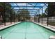 Inviting pool with refreshing blue water and a full screen enclosure for year-round enjoyment at 1505 Magnolia Ave, Sanford, FL 32771