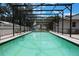 Lovely pool area with full screen enclosure, landscaping and a fence for privacy at 1505 Magnolia Ave, Sanford, FL 32771