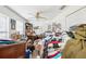 Cluttered bedroom with personal items and furniture needing arrangement and cleaning at 16249 Se 162Nd Ct, Weirsdale, FL 32195