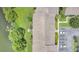 Birds eye view of lakeside condominium buildings with parking and lake access at 200 Maitland Ave # 122, Altamonte Springs, FL 32701