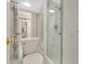 Bathroom with glass enclosed shower and adjacent toilet at 200 Maitland Ave # 122, Altamonte Springs, FL 32701