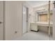 Bathroom featuring a large vanity and white tile floor at 200 Maitland Ave # 122, Altamonte Springs, FL 32701