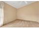 Neutral carpeted bedroom with baseboard trim and ceiling fan at 200 Maitland Ave # 122, Altamonte Springs, FL 32701