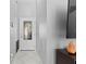 Bright entryway featuring tiled floor and a stylish front door at 202 Twisting Trl, Orlando, FL 32825