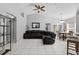 Spacious living room with tile flooring and ample natural light, ideal for relaxation at 202 Twisting Trl, Orlando, FL 32825