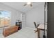 Home office with tile flooring, natural light, and an organized workspace at 202 Twisting Trl, Orlando, FL 32825