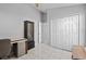 Office featuring tile floors, a large closet, and a well-lit workspace at 202 Twisting Trl, Orlando, FL 32825
