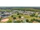 Beautiful aerial view of the neighborhood with a recreation area including baseball and basketball courts at 20330 Majestic St, Orlando, FL 32833