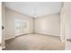 Neutral bedroom with a ceiling fan and double french doors to an exterior space at 2305 Edgewater Dr # 1509, Orlando, FL 32804