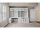Bright bedroom featuring custom built-in storage and desk space, and neutral carpet at 2305 Edgewater Dr # 1509, Orlando, FL 32804