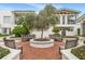 Charming courtyard seating area with benches and beautiful landscaping at 2305 Edgewater Dr # 1509, Orlando, FL 32804